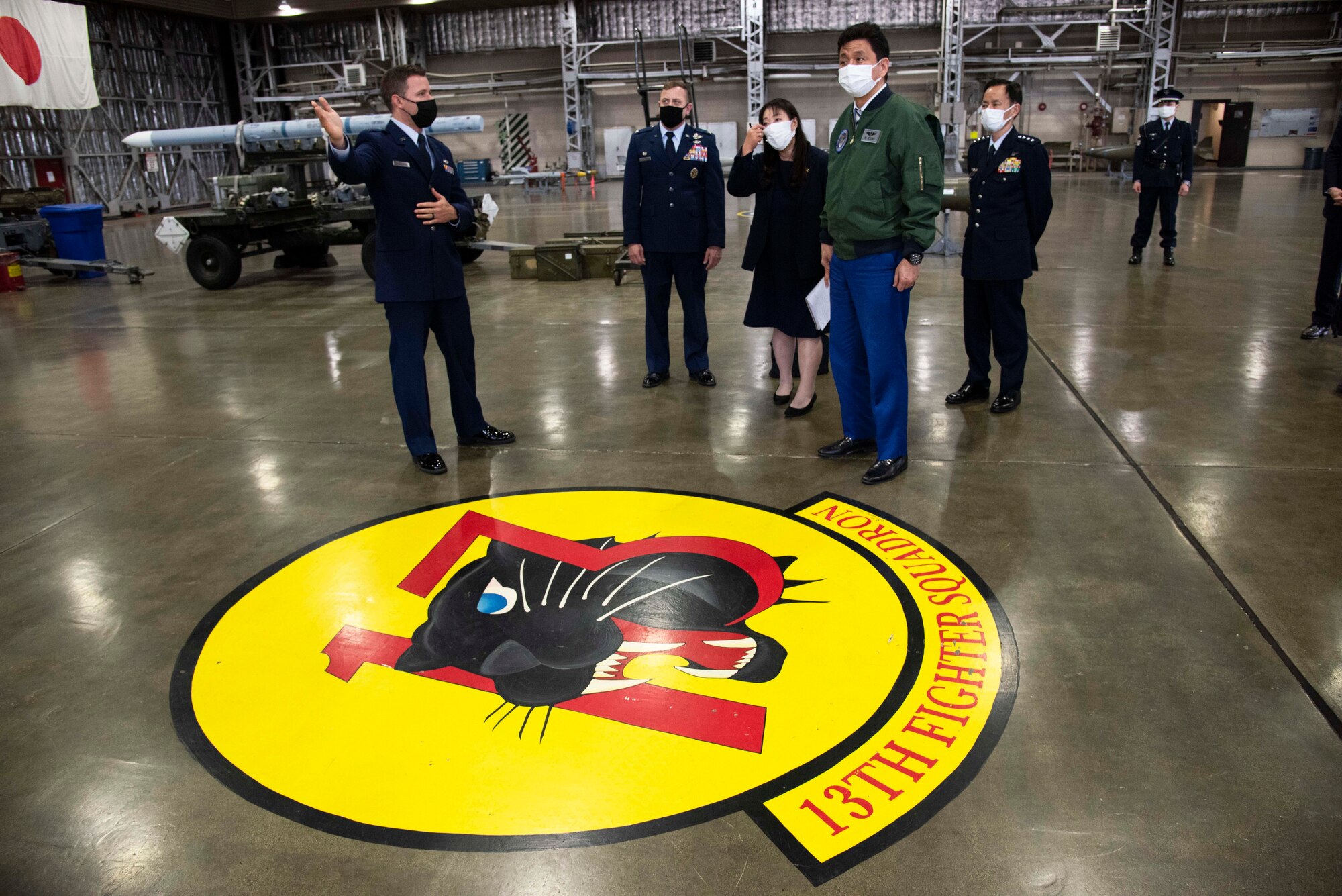 Capt. Austin Bangerter, 13th Fighter Squadron pilot, briefs Japan Minister of Defense, Nobuo Kishi, about the F-16 Fighting Falcon, and the 35th FW’s mission to defend Japan, during a visit at Misawa Air Base on April 3, 2021. During the visit senior leaders emphasized the importance of U.S. and Japanese bilateral interoperability through realistic, high quality training and operations. They also discussed the strategic importance of Misawa Air Base as the premier location for aircraft to conduct training in the Indo-Pacific region. (U.S. Air force photo by Maj. Cody Chiles)