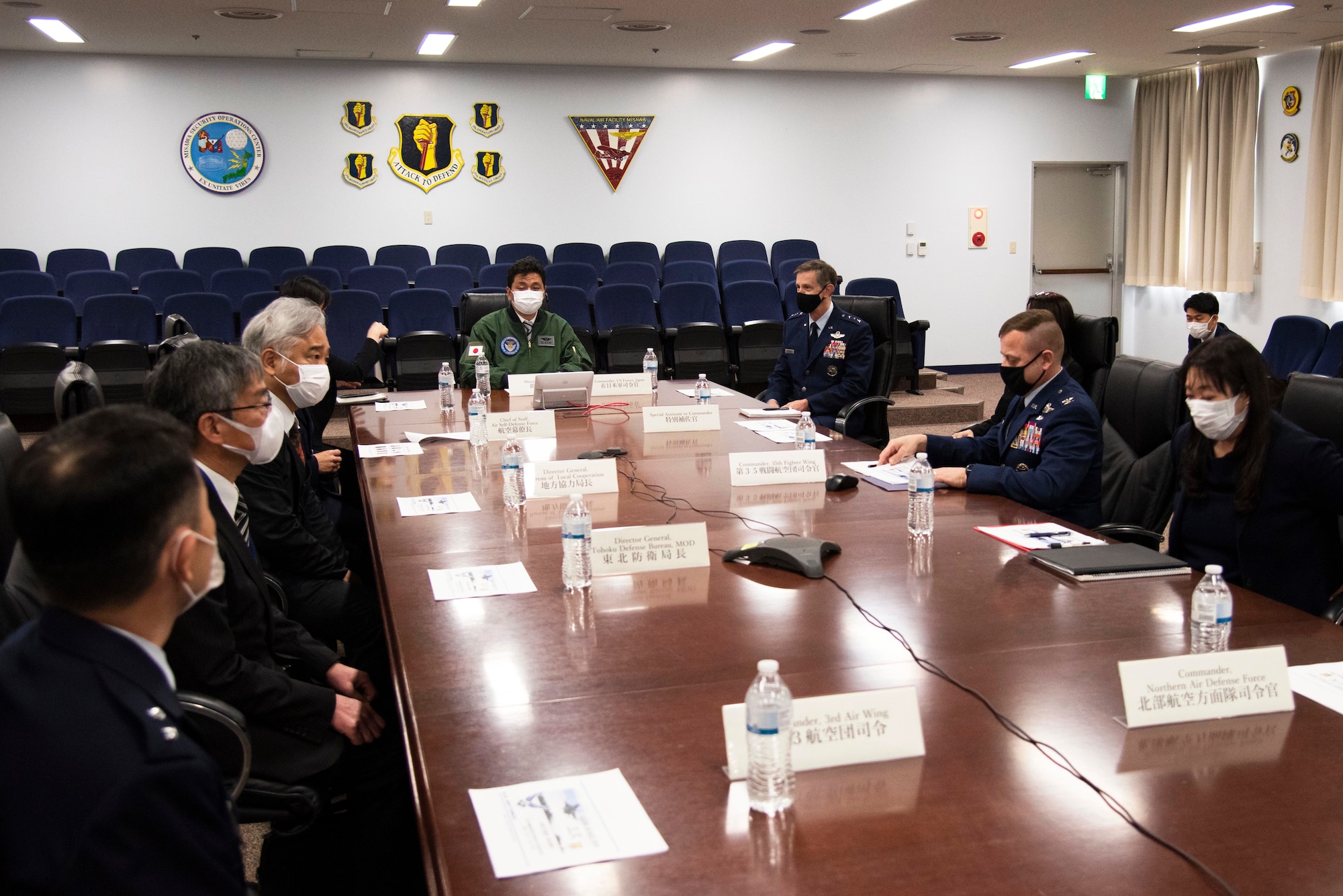 Japan Minister of Defense, Nobuo Kishi, receives the 35th Fighter Wing mission briefing from by Col. Jesse Friedel, 35th FW commander, during a visit at Misawa Air Base on April 3, 2021. During the visit, Minister of Defense Kishi received briefings about the F-16 Fighting Falcon, and the 35th FW’s mission to defend Japan with advanced Suppression of Enemy Air Defense and Destruction of Enemy Air Defense capabilities. SEAD and DEAD capabilities are critical to maintaining credible deterrence and defense in the Indo-Pacific region. (U.S. Air force photo by Maj. Cody Chiles)