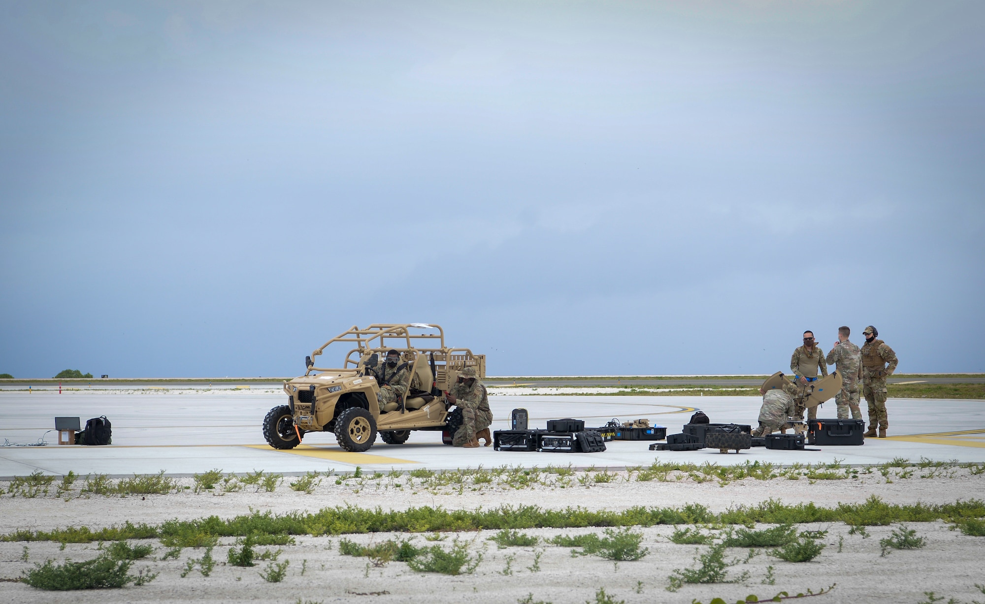 U.S. Air Airmen assigned to the 644th Combat Communications Squadron, set up a communication fly away kit during a field training exercise on Wake Island, Western Pacific, April 2, 2021.