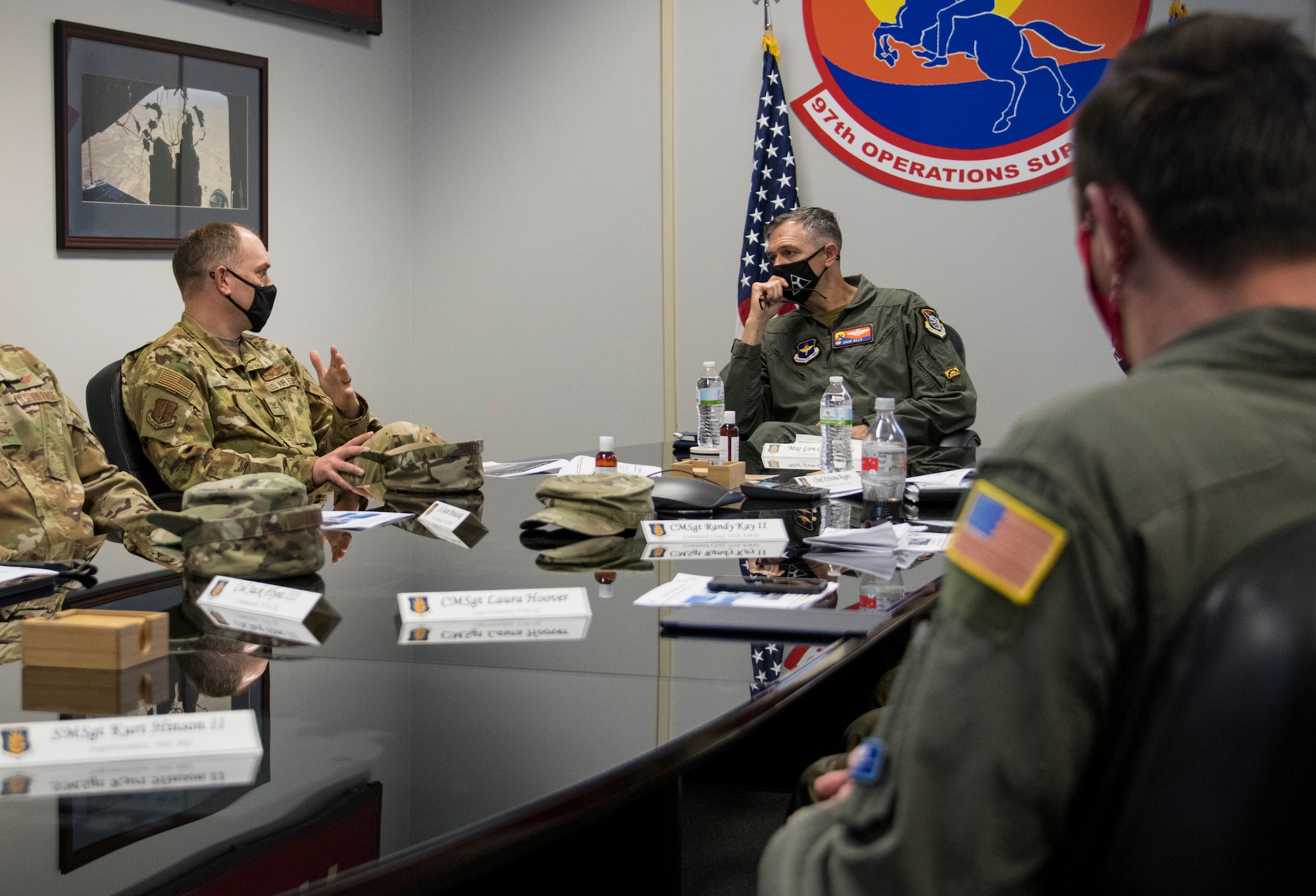 U.S. Air Force Col. Matthew Leard, 97th Air Mobility Wing (AMW) commander, speaks during a brief to Maj. Gen. Craig Wills, 19th Air Force commander, March 29, 2021, at Altus Air Force Base, Oklahoma. During Wills’ visit to the 97 AMW, he received multiple briefings explaining the updates and changes being made across the wing. (U.S. Air Force photo by Airman 1st Class Amanda Lovelace)