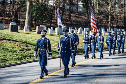 U.S. Air Force 1st Lt. Ngoc-Anh Huynh, United States Air Force Honor Guard Operations Support Flight commander, serves as Commander of Troops of the United States Honor Guard procession as part of modified military funeral honors with funeral escort for U.S. Air Force Lt. Col. Bruce Burns in Section 82 of Arlington National Cemetery, Arlington, Virginia, March 22, 2021. Burns served in the Air Force from 1962 to 1982. His spouse, Janet Burns, received the flag from his service. The funeral was an historic occasion for the United States Honor Guard, with the largest female presence on a pallbearers team in Air Force history. (U.S. Army photo by Elizabeth Fraser)