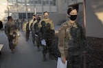 Soldiers line up for a temperature check at Fort Bliss, Texas, in 2020. The recent award of a small business contract by the Mission and Installation Contracting Command-Fort Sam Houston contracting office in Texas allows installations in the continental United States, Hawaii, Alaska and Puerto Rico to more rapidly provide base support services in support of mobilization, deployments, redeployments and demobilization.