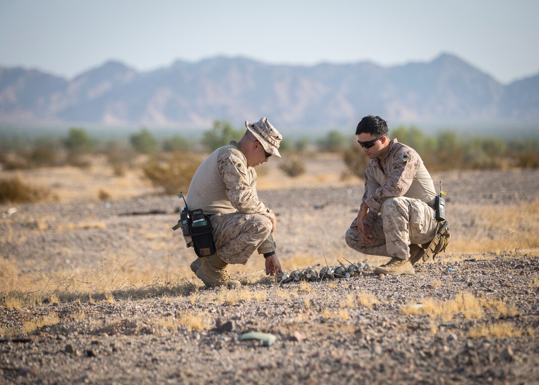 U.S. Marines stationed aboard Marine Corps Air Station (MCAS) Yuma, with Explosive Ordnance Disposal (EOD), conduct area operational clearance in support of Weapons and Tactics Instructors (WTI) course 2-20 near Camp Billy Machen, Calif., Sep. 21, 2020.