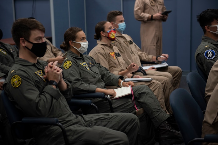 CORPUS CHRISTI, Texas (Oct. 30, 2020) The first students enrolled in Naval Aviation Training Next-Project Avenger receive briefings from dedicated instructors. Project Avenger is a prototype syllabus designed to train student naval aviators to a greater level of proficiency in a shorter period of time than the traditional syllabus to increase fleet aviator availability. (U.S. Navy photo by Anne Owens/Released)