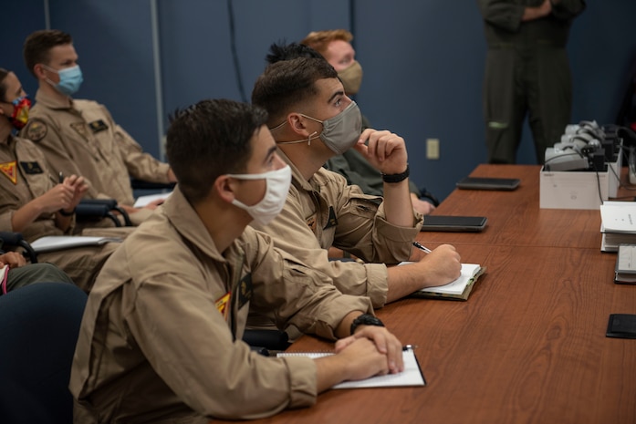 CORPUS CHRISTI, Texas (Oct. 30, 2020) The first students enrolled in Naval Aviation Training Next-Project Avenger receive briefings from dedicated instructors. Project Avenger is a prototype syllabus designed to train student naval aviators to a greater level of proficiency in a shorter period of time than the traditional syllabus to increase fleet aviator availability. (U.S. Navy photo by Anne Owens/Released)