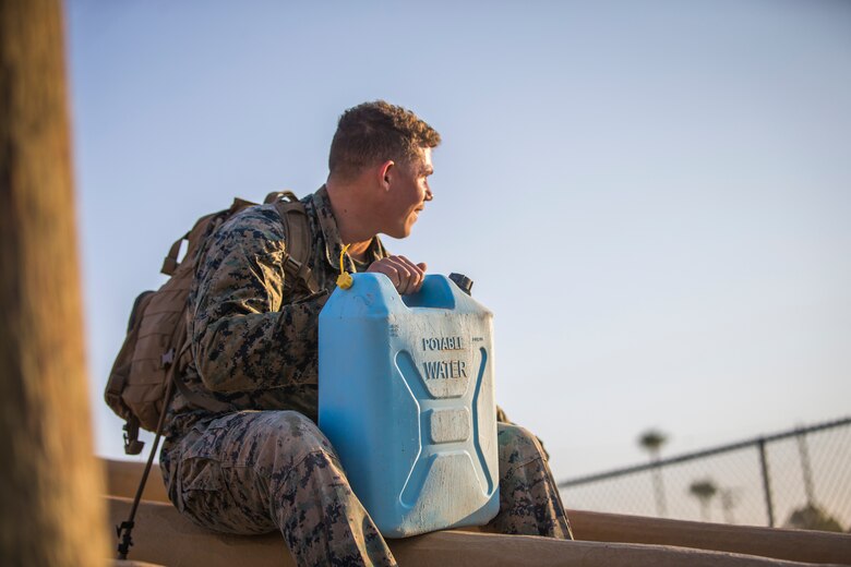 U.S. Marines with Headquarters and Headquarters Squadron (H&HS), compete in the monthly squadron competition on Marine Corps Air Station Yuma, Ariz., Oct. 9, 2020. The competition consisted of various challenges and obstacles as a way of improving morale and comradery while raising esprit de corps through competition. (U.S. Marine Corps photo by Lance Cpl. John Hall)