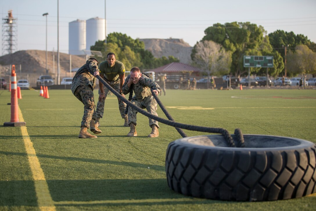 U.S. Marines with Headquarters and Headquarters Squadron (H&HS), compete in the monthly squadron competition on Marine Corps Air Station Yuma, Ariz., Oct. 9, 2020. The competition consisted of various challenges and obstacles as a way of improving morale and comradery while raising esprit de corps through competition. (U.S. Marine Corps photo by Lance Cpl. John Hall)