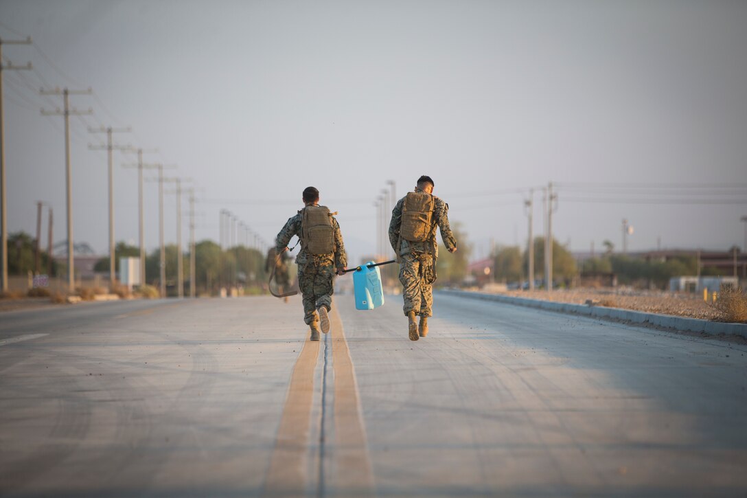 U.S. Marines with Headquarters and Headquarters Squadron (H&HS), compete in the monthly squadron competition on Marine Corps Air Station Yuma, Ariz., Oct. 9, 2020.
