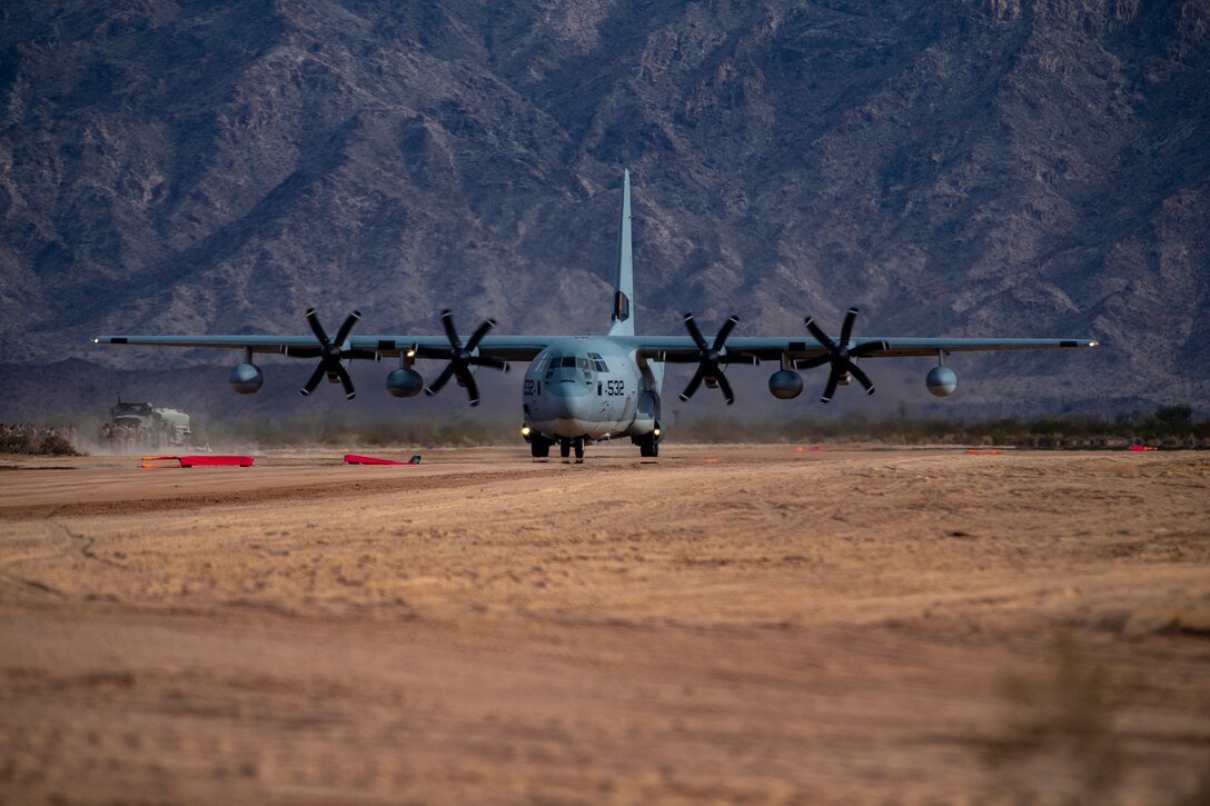 A U.S. Marine Corps KC-130J Hercules aircraft with Marine Aviation Weapons and Tactics Squadron One (MAWTS-1) lands at Assault Landing Zone (ALZ) Hawkeye aboard Marine Corps Air Station (MCAS) Yuma training ground, October 23, 2020. This was the first landing of an aircraft on an unimproved assault strip aboard MCAS Yuma.  (U.S. Marine Corps photo by Lance Cpl. Gabrielle Sanders)