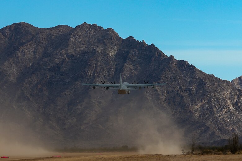A U.S. Marine Corps KC-130J Hercules aircraft with Marine Aviation Weapons and Tactics Squadron One (MAWTS-1) lands at Assault Landing Zone (ALZ) Hawkeye aboard Marine Corps Air Station (MCAS) Yuma training ground, October 23, 2020. This was the first landing of an aircraft on an unimproved assault strip aboard MCAS Yuma.  (U.S. Marine Corps photo by Lance Cpl. Gabrielle Sanders)