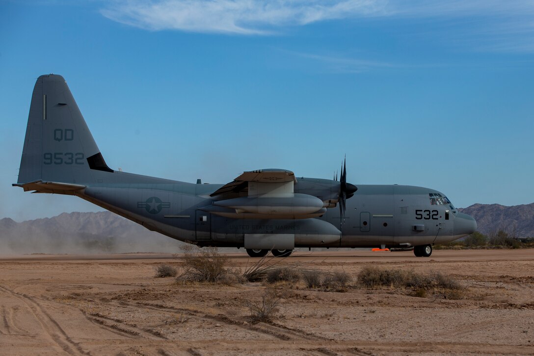 A U.S. Marine Corps KC-130J Hercules aircraft with Marine Aviation Weapons and Tactics Squadron One (MAWTS-1) lands at Assault Landing Zone (ALZ) Hawkeye aboard Marine Corps Air Station (MCAS) Yuma training ground, October 23, 2020. This was the first landing of an aircraft on an unimproved assault strip aboard MCAS Yuma.  (U.S. Marine Corps photo by Lance Cpl. Gabrielle Sanders)