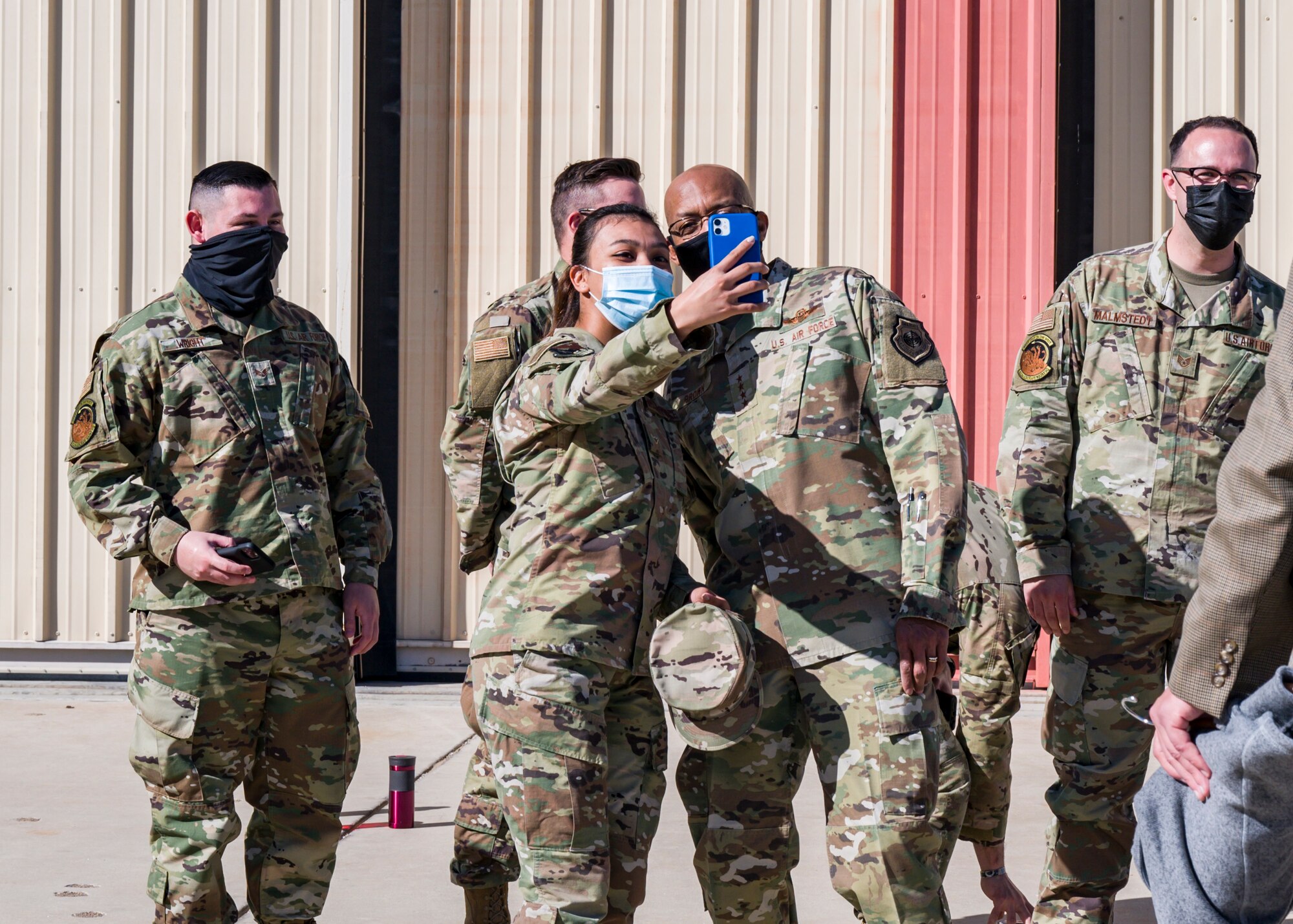 Airman Stephany Rayas-Calderon, 412th Comptroller Squadron, takes a "selfie" with Air Force Chief of Staff Gen. Charles Q. Brown, Jr., during his visit to Edwards Air Force Base, California, March 31. (Air Force photo by Giancarlo Casem)