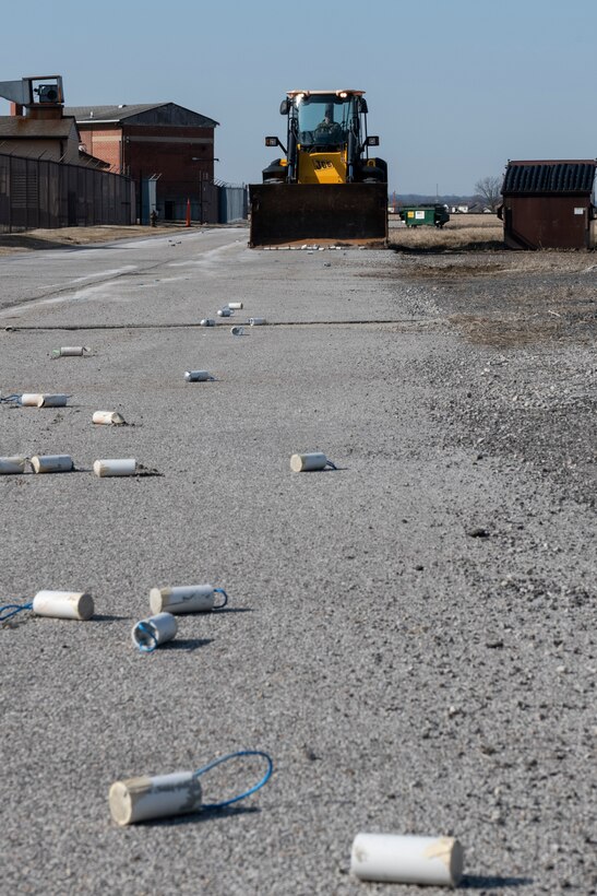 Tech. Sgt. Jeffery Butera, 932nd Airlift Wing Explosive Ordnance Disposal technician, clears the simulated airfield of simulated unexploded ordnance, Scott Air Force Base, Ill., March 7, 2021. EOD conducts airfield clearance training to build their skills, teamwork and unity with other members involved in the process. (U.S. Air Force photo by Senior Airman Brooke Spenner)