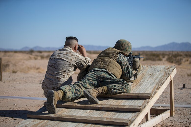 U.S. Marines with Headquarters and Headquarters Squadron (H&HS) participate in "Operation Backbone" in Yuma, Arizona, Oct. 28, 2020. Operation Backbone helps to strengthen the warrior spirit in non-commissioned officers and promote cohesion between the different sections of H&HS. The exercise consisted of multiple live fire events on the range along with several classes from various section representatives of H&HS. (U.S. Marine Corps photo by Lance Cpl. John Hall)