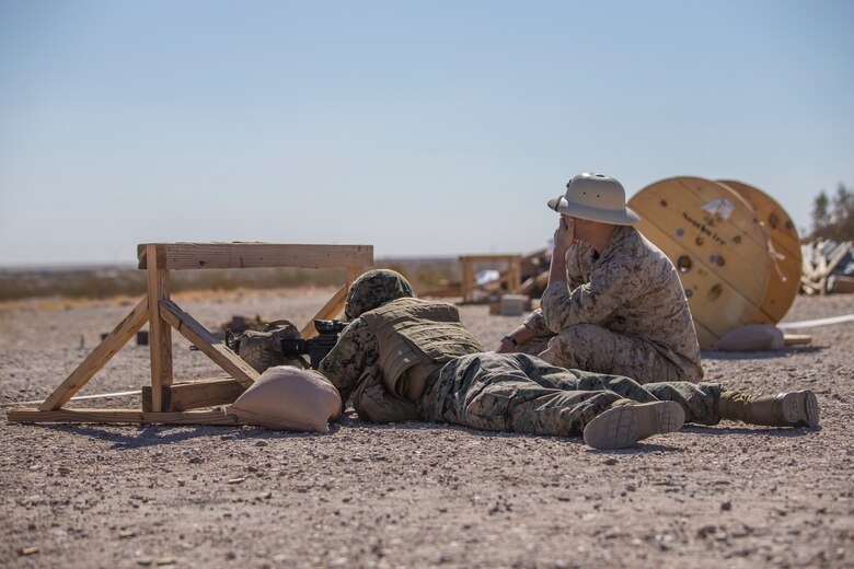 U.S. Marines with Headquarters and Headquarters Squadron (H&HS) participate in "Operation Backbone" in Yuma, Arizona, Oct. 28, 2020. Operation Backbone helps to strengthen the warrior spirit in non-commissioned officers and promote cohesion between the different sections of H&HS. The exercise consisted of multiple live fire events on the range along with several classes from various section representatives of H&HS. (U.S. Marine Corps photo by Lance Cpl. John Hall)