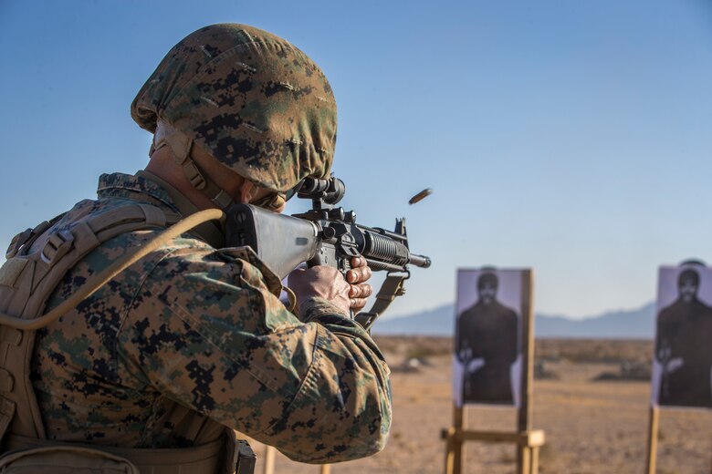 U.S. Marine Corps SgtMaj. Luis A. Galvez, with Headquarters and Headquarters Squadron (H&HS) participates in "Operation Backbone" in Yuma, Arizona, Oct. 28, 2020. Operation Backbone helps to strengthen the warrior spirit in non-commissioned officers and promote cohesion between the different sections of H&HS. The exercise consisted of multiple live fire events on the range along with several classes from various section representatives of H&HS. (U.S. Marine Corps photo by Lance Cpl. John Hall)