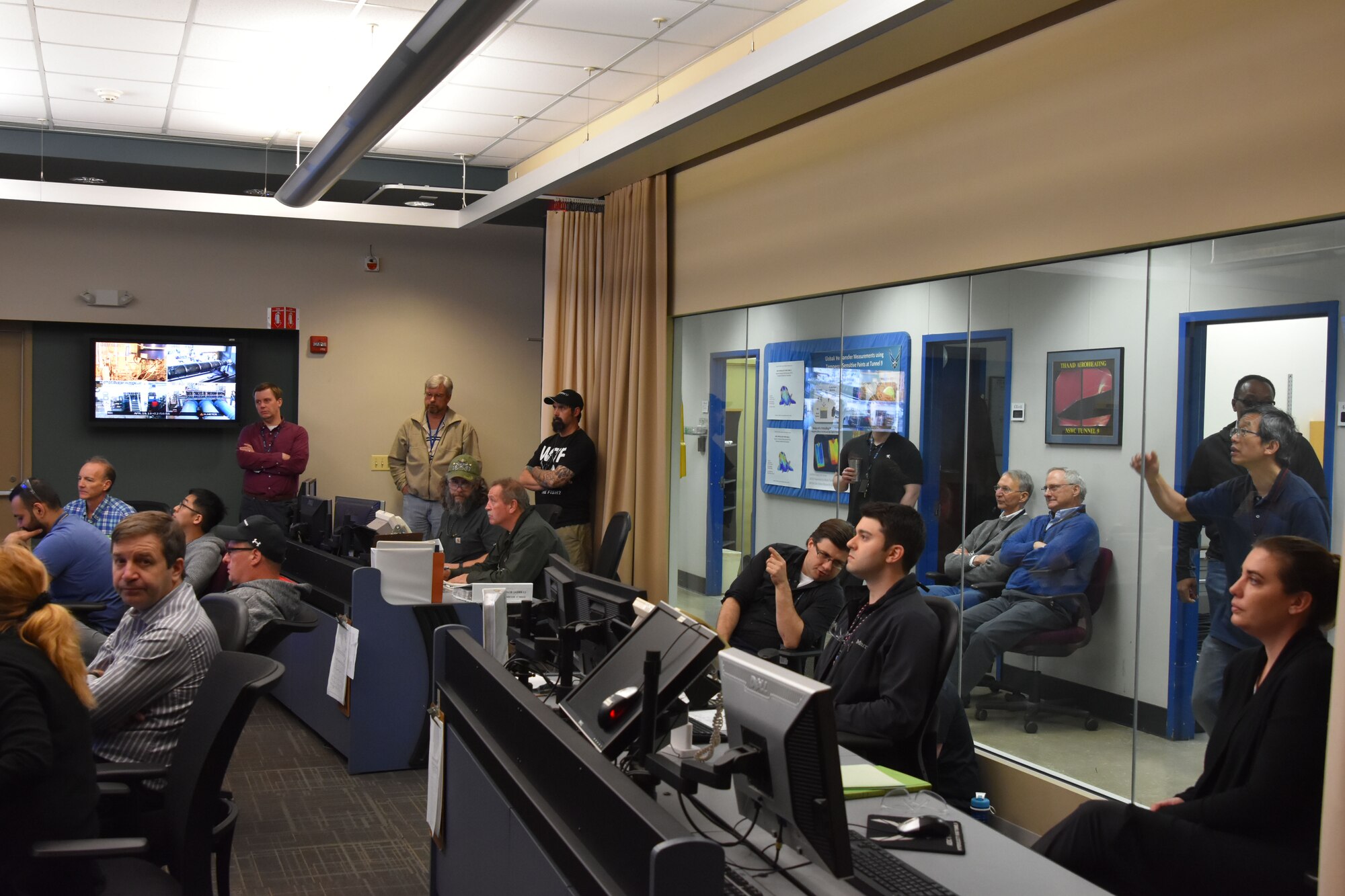 Team AEDC members at AEDC Hypervelocity Wind Tunnel 9 in White Oak, Md., conduct the initial shakeout of the Mach 18 system from the facility control room in 2019. Calibration of the Mach 18 system was completed at Tunnel 9 in July 2020. The system checked out, allowing Tunnel 9 to begin offering Mach 18 testing to customers. The first customer runs at Mach 18 occurred in August 2020. (Courtesy photo) (This is image was altered by obscuring badges for security purposes.)