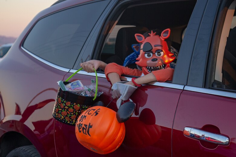Service members and their families decorated their vehicle trunks in the spirit of Halloween during the annual Red Ribbon “Trunk or Treat” drive thru event held aboard Marine Corps Air Station Yuma, Ariz., October 29, 2020. The event was hosted and sponsored by Marine Corps Community Services to promote a drug-free Marine Corps and raise awareness for sexual assault prevention.   (U.S. Marine Corps photo by LCpl. Gabrielle Sanders)
