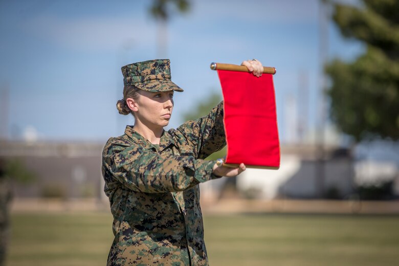 U.S. Marines with Marine Corps Air Station (MCAS) Yuma, participate in the 245th Marine Corps birthday cake cutting ceremony at the Parade Deck on MCAS Yuma, Ariz., Nov. 5, 2020. The annual ceremony was held in honor of the 245th Marine Corps birthday, signifying the passing of traditions from one generation to the next. (U.S. Marine Corps photo by Lance Cpl. John Hall)