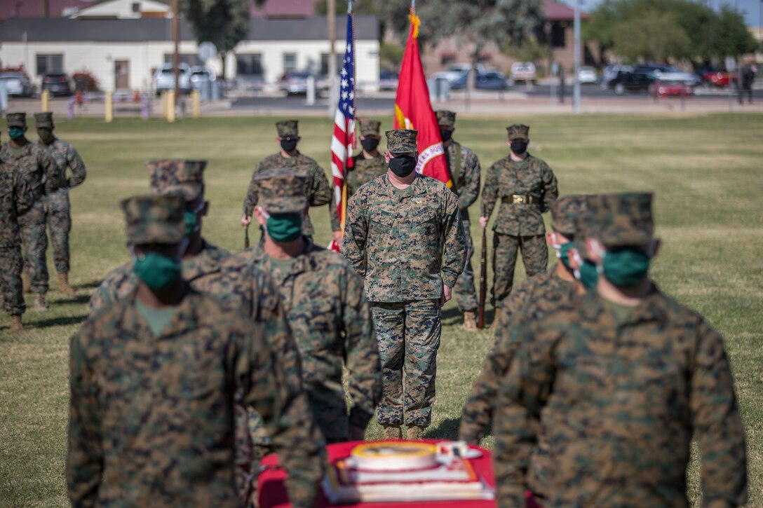 U.S. Marines with Marine Corps Air Station (MCAS) Yuma, participate in the 245th Marine Corps birthday cake cutting ceremony at the Parade Deck on MCAS Yuma, Ariz., Nov. 5, 2020.