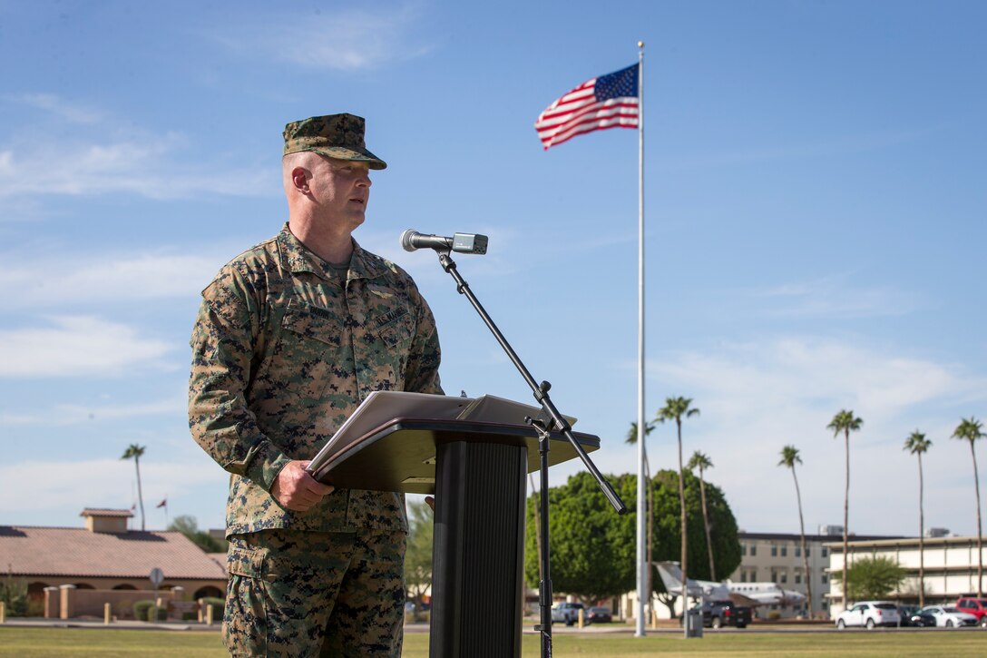 U.S. Marines with Marine Corps Air Station (MCAS) Yuma, participate in the 245th Marine Corps birthday cake cutting ceremony at the Parade Deck on MCAS Yuma, Ariz., Nov. 5, 2020.