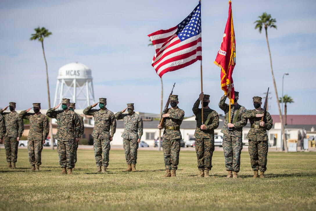 U.S. Marines with Marine Corps Air Station (MCAS) Yuma, participate in the 245th Marine Corps birthday cake cutting ceremony at the Parade Deck on MCAS Yuma, Ariz., Nov. 5, 2020.
