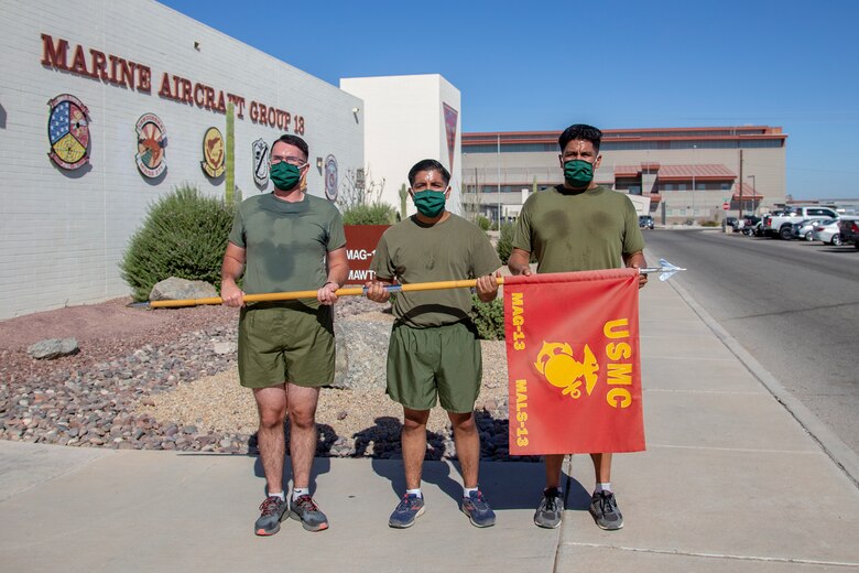 Cpl. Alexander McMurry, Cpl Augustus Smith, and Cpl Jonathan Ceja, avaition supply specialists, with Marine Aviation Logistics Squadron 13 (MALS-13) run two miles for the Marine Corps Birthday run aboard Marine Corps Air Station (MCAS) Yuma, Nov. 4 2020. Marines with MALS-13 run a total of 245 miles in honor of the 245th Marine Corps Birthday. (U.S. Marine Corps photo by LCpl. Gabrielle Sanders)