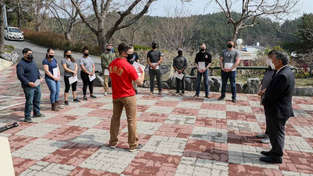 U.S. Marines with U.S. Marine Corps Forces – Korea received Certificates of Appreciation for removing tree stumps and rocks during a volunteer event at Sunrin Orphanage, Pohang, South Korea, March 13, 2021. The trees had fallen down last fall due to a strong typhoon and the rocks had become safety hazards for the children. The event encapsulates the strong bond between the Marine Corps and the orphanage that began with its founding in 1952. (U.S. Marine Corps photo by Sgt. Ash McLaughlin)