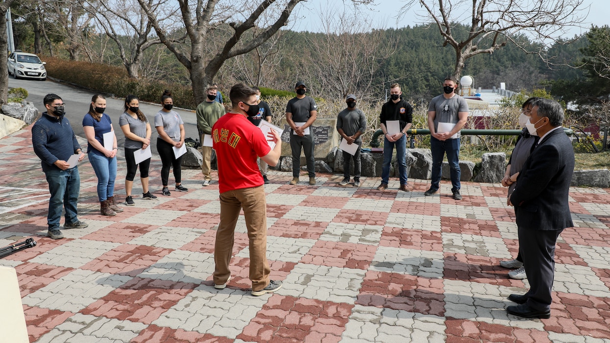U.S. Marines with U.S. Marine Corps Forces – Korea received Certificates of Appreciation for removing tree stumps and rocks during a volunteer event at Sunrin Orphanage, Pohang, South Korea, March 13, 2021.