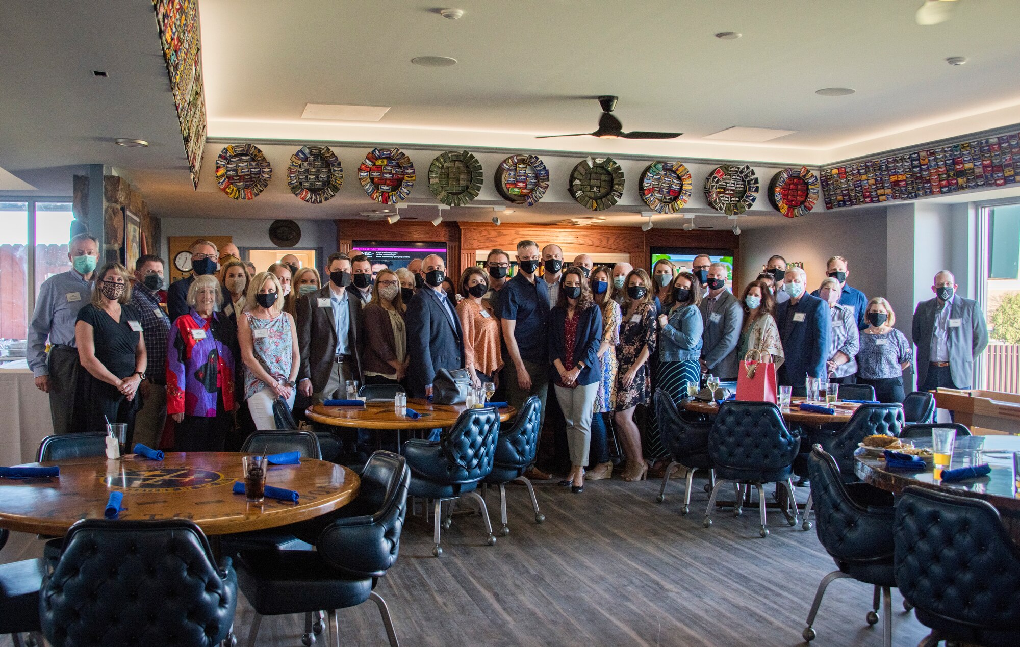 Members of the 97th Air Mobility Wing and community leaders pose for a group photo on March 29, 2020, at Charlie’s on Altus Air Force Base, Oklahoma. Altus local leaders received the opportunity to meet with Maj. Gen. Craig Wills, 19th Air Force commander, and connect with other military leaders during dinner at Charlie’s. (U.S. Air Force photo by Airman 1st Class Amanda Lovelace)