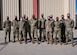 Air Force Chief of Staff Gen. Charles Q. Brown, Jr., poses for a photo with members of the 412th Test Wing during his visit to Edwards Air Force Base, Calif., March 31, 2021. During his visit, Brown met with wing leadership and was briefed on the ongoing test missions on the base.