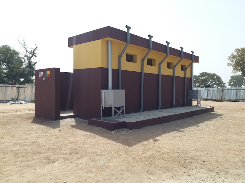 A multi-compartment ventilated improved pit latrine is seen here at the newly constructed health clinic site in the village of Godjekoara, Benin in Africa. The health clinic was one of two recently completed in the region by the U.S. Army Corps of Engineers, Europe District in support of AFRICOM and coordinated with the U.S. State Department. Both clinics feature similar latrine facilities, which are a type of specially designed latrines built in areas where is no dependable supply of piped water that feature ventilation pipes with built-in fly screens to reduce the gathering of flies and other disease carrying insects that often gather at restroom sites and are laid out to reduce lingering odors associated with their use.