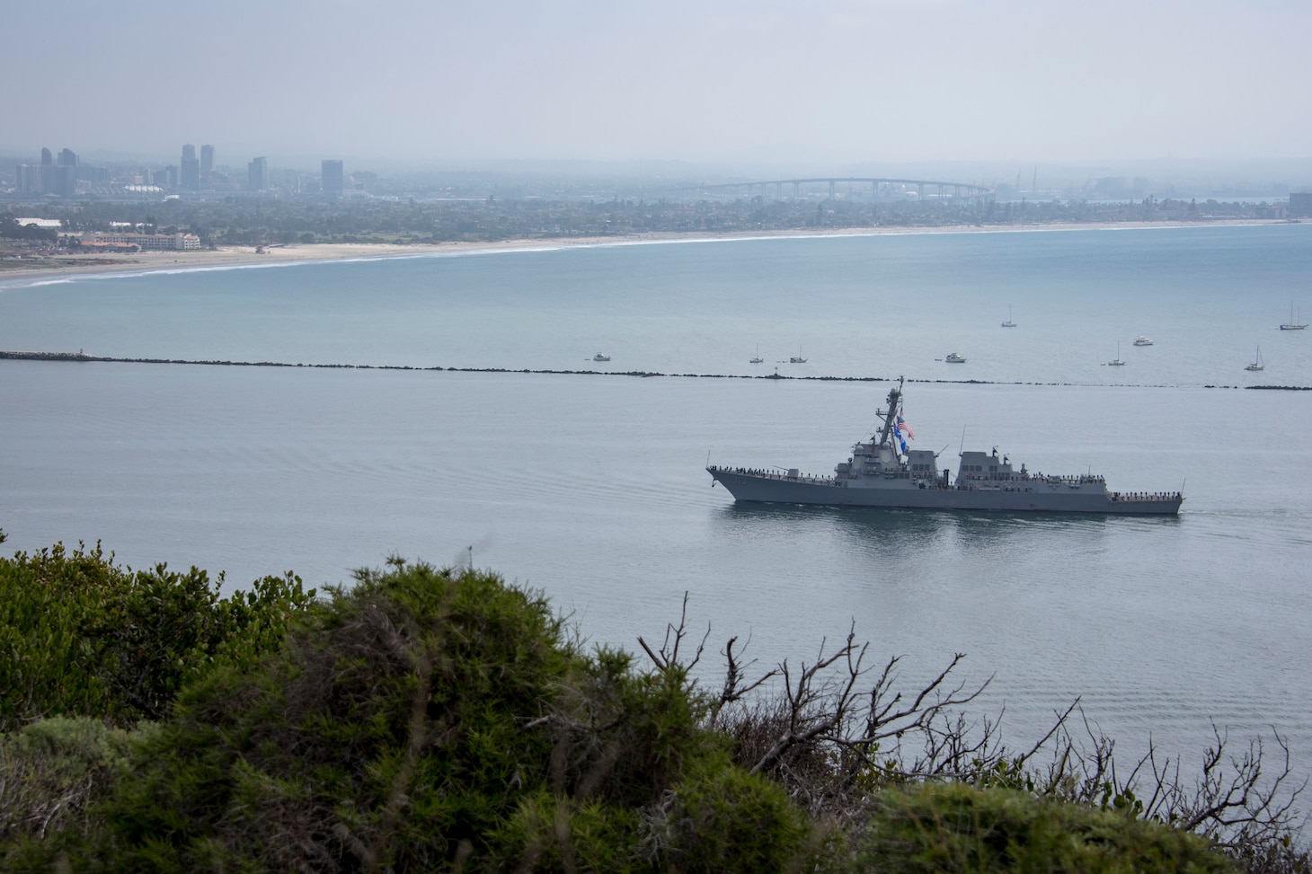 The Arleigh Burke-class guided-missile destroyer USS John Finn (DDG 113) returns to Naval Base San Diego.