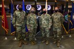 Leaders take photo on ops floor
