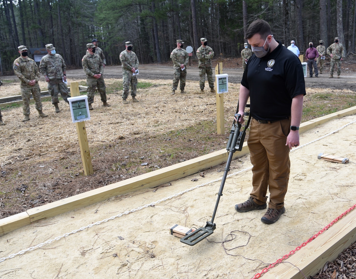 Current and former Virginia National Guard Soldiers and guests attend a dedication ceremony for the new Banks-Lambert Handheld Detection Lane March 26, 2021, at Fort Pickett, Virginia.