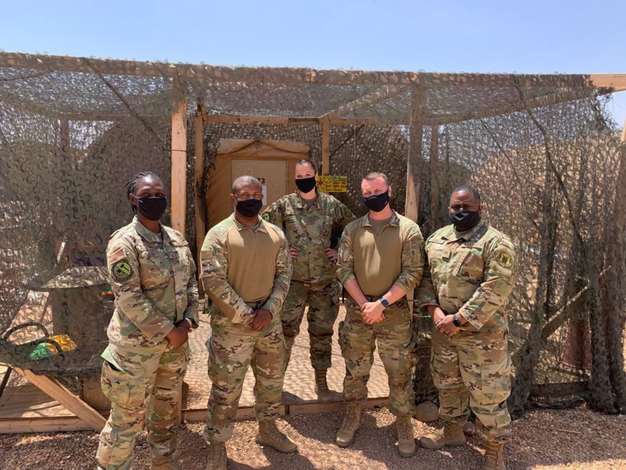 The 724th Expeditionary Air Base Squadron acquisition team poses for a photo at Nigerien Air Base 201, Agadez, Niger, April 6, 2021. The acquisition flight supports the AB 201 mission by providing full-range financial management assistance and being the acquisitions focal point for commodities, services and construction requirements. (Courtesy Photo)