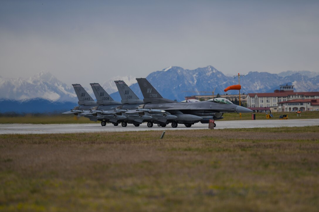 Four U.S. Air Force F-16 Fighting Falcons assigned to the 510th Fighter Squadron prepare to take off to support exercise INIOCHOS 21, Aviano Air Base, Italy, April 6, 2021. INIOCHOS is an annual exercise in Greece that provides participants the opportunity to develop capabilities in planning and conducting complex air operations in a multinational joint forces environment. The exercise provides advanced and realistic aircrew training to strengthen interoperability of allied and partner air forces. (U.S. Air Force photo by Senior Airman Ericka A. Woolever)