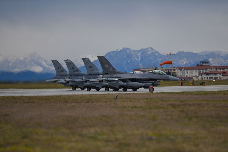 Four U.S. Air Force F-16 Fighting Falcons assigned to the 510th Fighter Squadron prepare to take off to support exercise INIOCHOS 21, Aviano Air Base, Italy, April 6, 2021. INIOCHOS is an annual exercise in Greece that provides participants the opportunity to develop capabilities in planning and conducting complex air operations in a multinational joint forces environment. The exercise provides advanced and realistic aircrew training to strengthen interoperability of allied and partner air forces. (U.S. Air Force photo by Senior Airman Ericka A. Woolever)