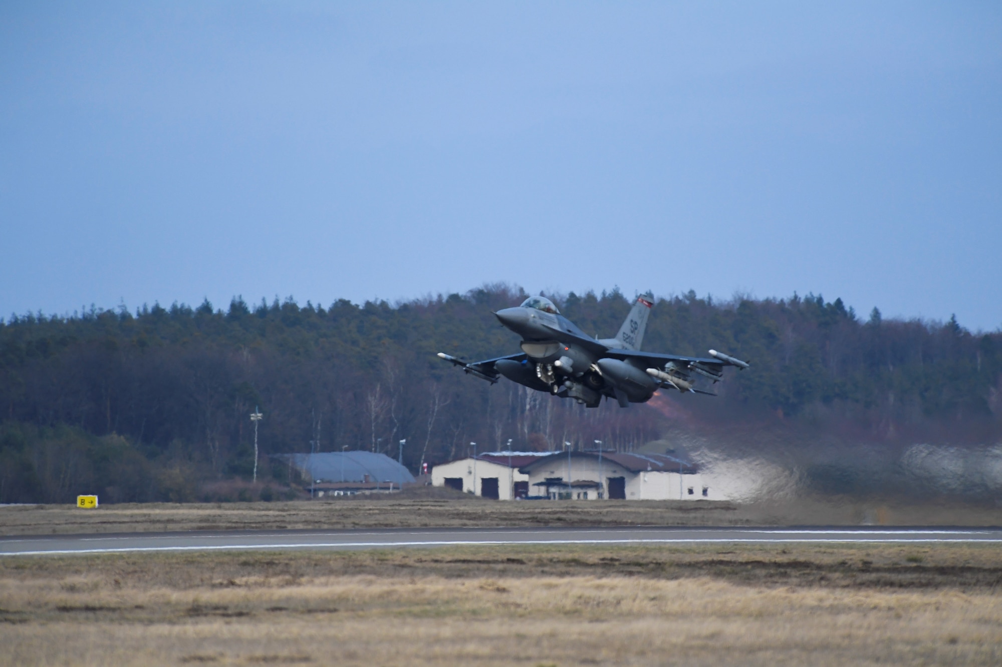 A U.S. Air Force F-16 Fighting Falcon aircraft from the 480th Fighter Squadron takes off during an Agile Combat Employment exercise at Ramstein Air Base, Germany, March 23, 2021. The exercise, which ran from March 22-26, featured jets flying two missions a day. (U.S. Air Force photo by Tech. Sgt. Warren D. Spearman Jr.)