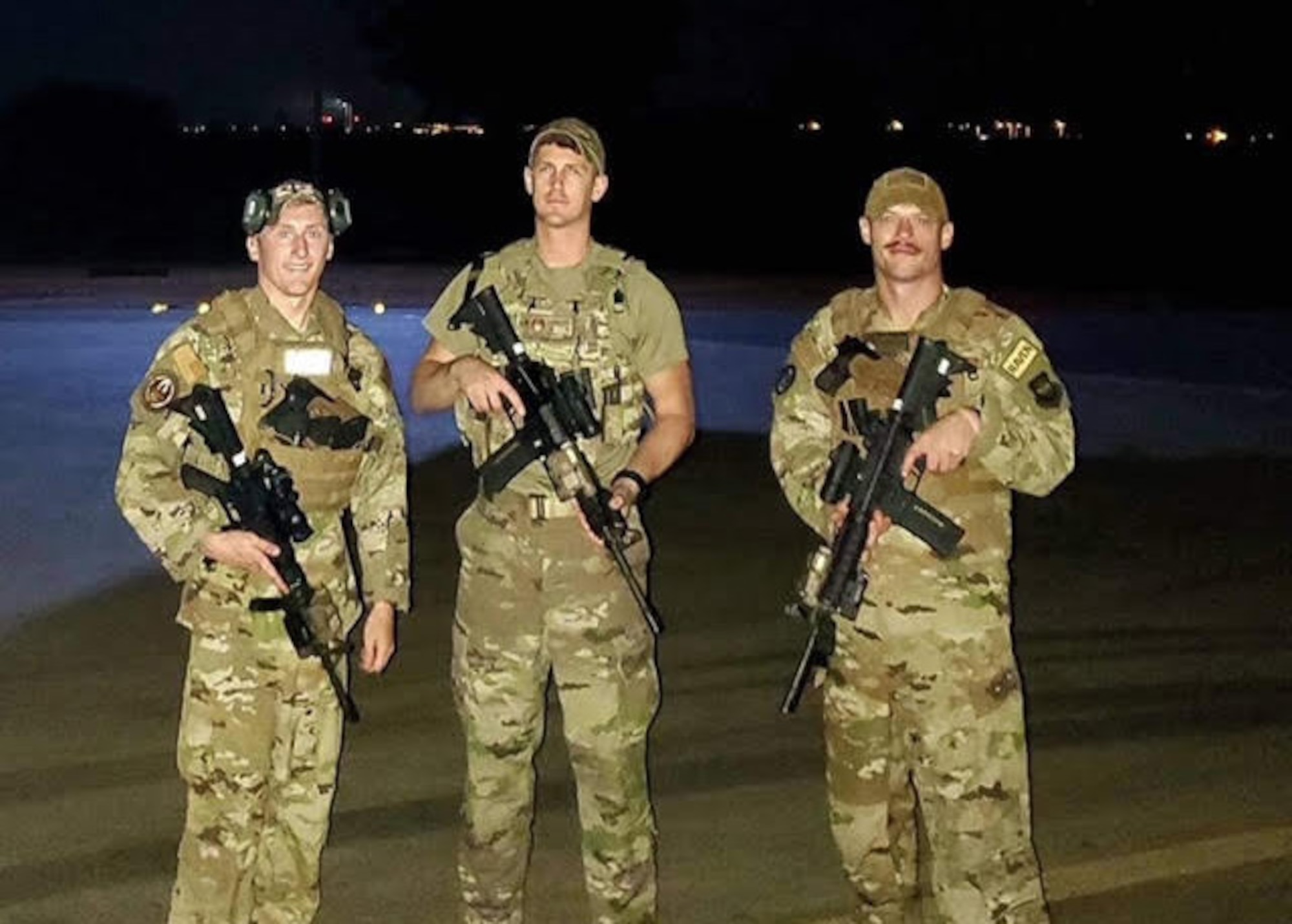 U.S. Air Force Airmen from the 133rd Security Forces Squadron’s Phoenix Raven program pose for a group photo at an undisclosed location.