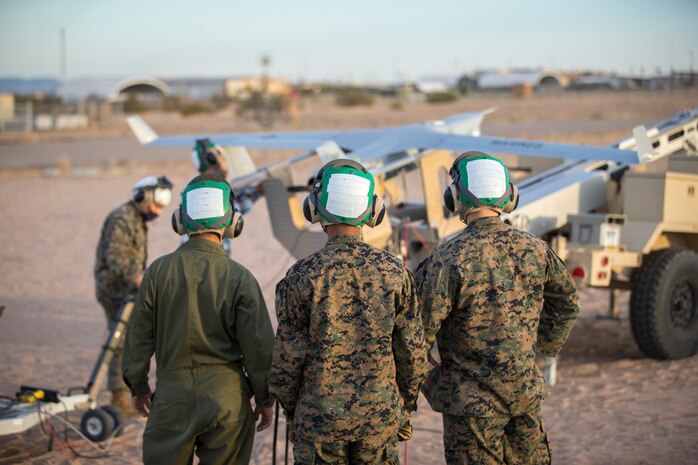 U.S. Marines with Marine Unmanned Aerial Vehicle Squadron (VMU) 1 set up and launch a RQ-21 "Blackjack" unmanned aerial vehicle (UAV) on Canon Air Defense Complex in Yuma, Arizona, Nov. 5, 2020. The RQ-21 is designed to support Marine Corps mission readiness by providing forward reconnaissance without having to put Marine Corps personnel at risk.(U.S. Marine Corps photo by Lance Cpl. John Hall)