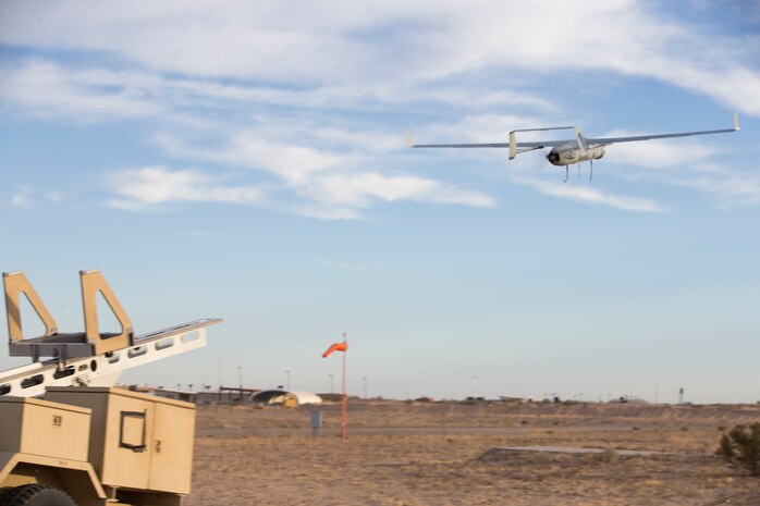 U.S. Marines with Marine Unmanned Aerial Vehicle Squadron (VMU) 1 set up and launch a RQ-21 "Blackjack" unmanned aerial vehicle (UAV) on Canon Air Defense Complex in Yuma, Arizona, Nov. 5, 2020. The RQ-21 is designed to support Marine Corps mission readiness by providing forward reconnaissance without having to put Marine Corps personnel at risk.(U.S. Marine Corps photo by Lance Cpl. John Hall)