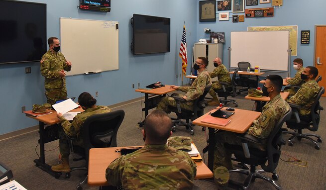 Staff Sgt. Travis Matzdorf, a Joint Tactical Ground Stations (JTAGS) initial qualification course instructor with U.S. Army Space and Missile Defense Command, instructs the current JTAGS IQC at the Dr. Peter G. Pappas Training Facility in Colorado Springs, Colo., March 29, 2021. (US Army photo by Sgt. 1st Class Aaron Rognstad/RELEASED)