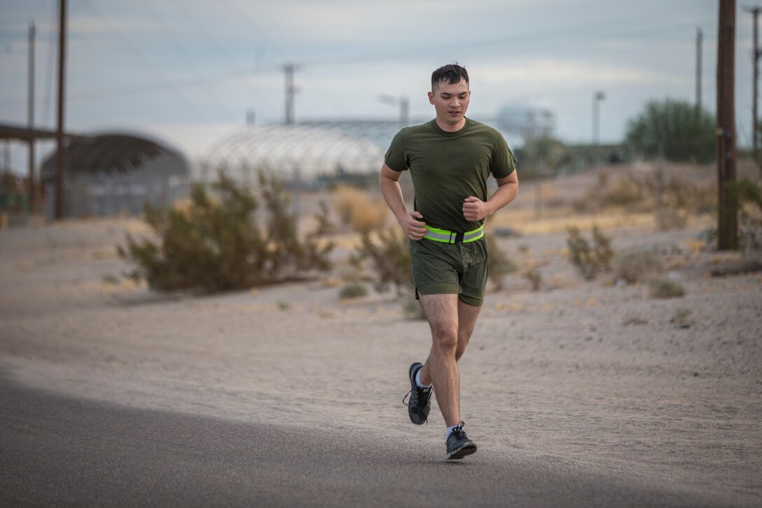U.S. Marine Corps Corporal Andres Hernandez, a reproduction specialist, with Headquarters and Headquarters Squadron (H&HS), competes in the monthly squadron competition on Marine Corps Air Station Yuma, Ariz., Nov. 6, 2020.