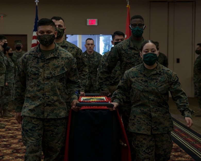 U.S. Marines with Headquarters and Headquarters Squadron conduct a ceremony celebrating the Marine Corps' 245th birthday aboard Marine Corps Air Station Yuma on Nov. 13, 2020. This event allowed Marines to participate in the customary traditions while following COVID-19 guidelines. ( U.S. Marine Corps photo by Cpl. Jason Monty)