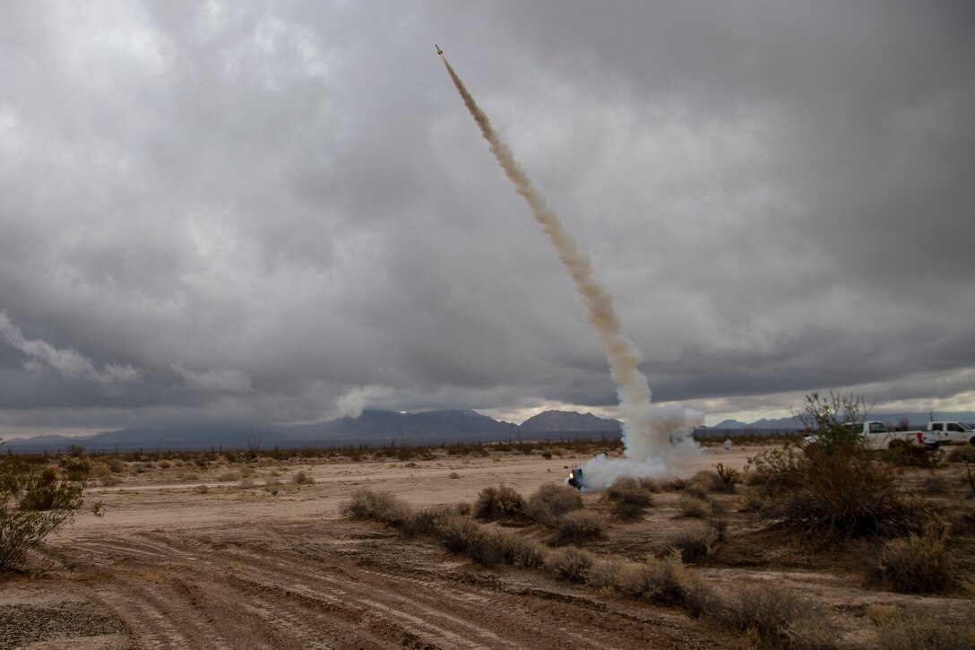 A KC-130J with Marine Aerial Refueler Transport Squadron (VMGR) 152 expends countermeasure flares to defeat a simulated surface-to-air missile, or Smokey Sam at Barry M. Goldwater Range West aboard Marine Corps Air Station Yuma training grounds, Jan 21, 2021.  The Smokey Sam tests the aircraft’s electronic countermeasure systems and ensures that flares are expended to defeat the infrared threat.  (U.S. Marine Corps photo by LCpl. Gabrielle Sanders)