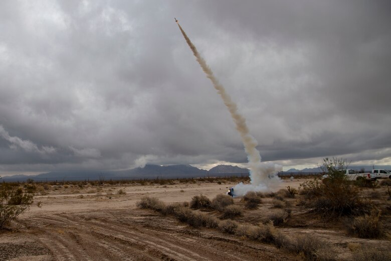A KC-130J with Marine Aerial Refueler Transport Squadron (VMGR) 152 expends countermeasure flares to defeat a simulated surface-to-air missile, or Smokey Sam at Barry M. Goldwater Range West aboard Marine Corps Air Station Yuma training grounds, Jan 21, 2021.  The Smokey Sam tests the aircraft’s electronic countermeasure systems and ensures that flares are expended to defeat the infrared threat.  (U.S. Marine Corps photo by LCpl. Gabrielle Sanders)