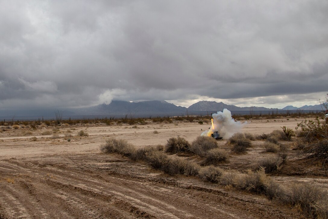 A KC-130J with Marine Aerial Refueler Transport Squadron (VMGR) 152 expends countermeasure flares to defeat a simulated surface-to-air missile, or Smokey Sam at Barry M. Goldwater Range West aboard Marine Corps Air Station Yuma training grounds, Jan 21, 2021.  The Smokey Sam tests the aircraft’s electronic countermeasure systems and ensures that flares are expended to defeat the infrared threat.  (U.S. Marine Corps photo by LCpl. Gabrielle Sanders)