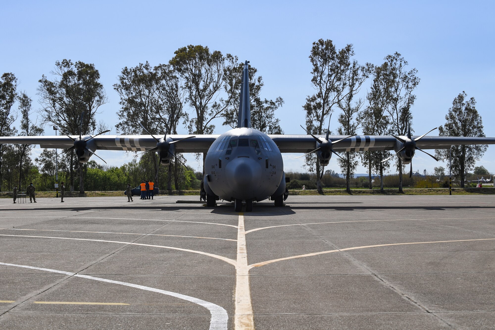 A U.S. Air Force C-130 Hercules carrying members assigned to the 31st Fighter Wing sits on a runway at Andravida Air Base, Greece, April 6, 2021. Prior to take off, measures such as COVID-19 tests and social distancing were taken to help mitigate exposure to COVID-19. (U.S. Air Force photo by Airman 1st Class Thomas S. Keisler IV)