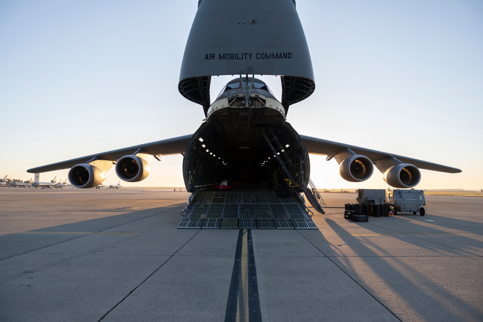 A C-5M Space Cargo Modification sits on the flight line March 16, 2021, at Travis Air Force Base, California. Airmen assigned to the 22nd AS flew the C-5M to transport a satellite from Moffett AirField, California to Cape Canaveral, Florida. (U.S. Air Force photo by Senior Airman Cameron Otte)